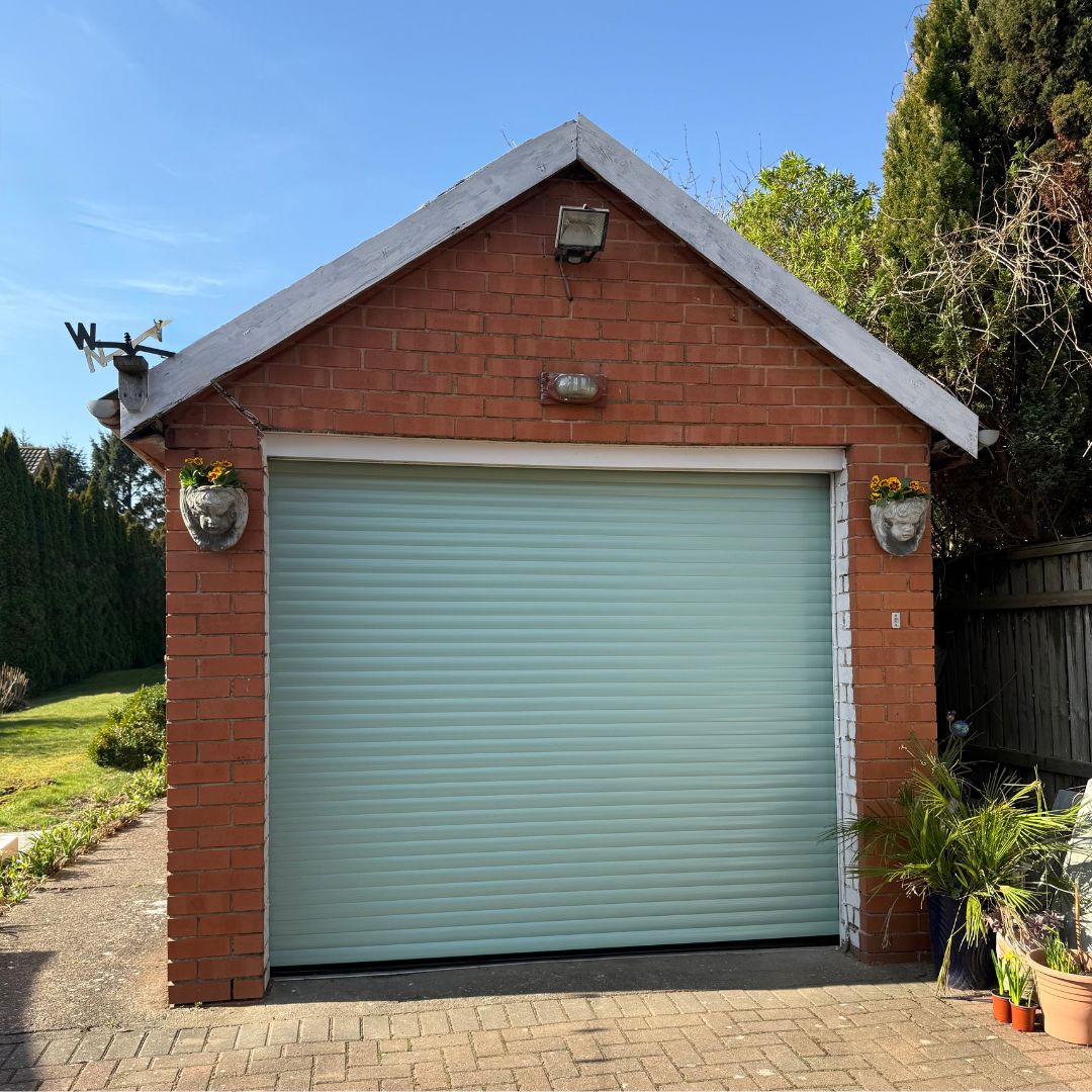 Pinterest-Inspired-Perfection-Electric-Garage-Door-Chartwell Green Garolla Door