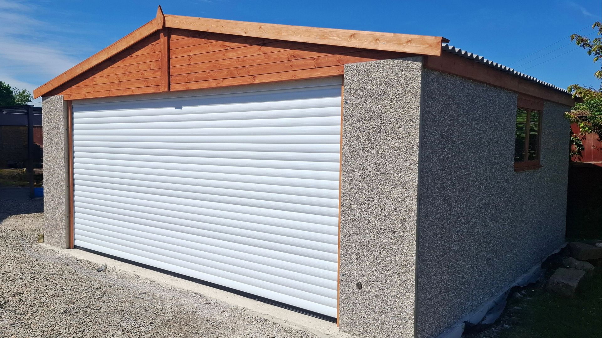 Going on Holiday this summer-wide white Garolla electric door