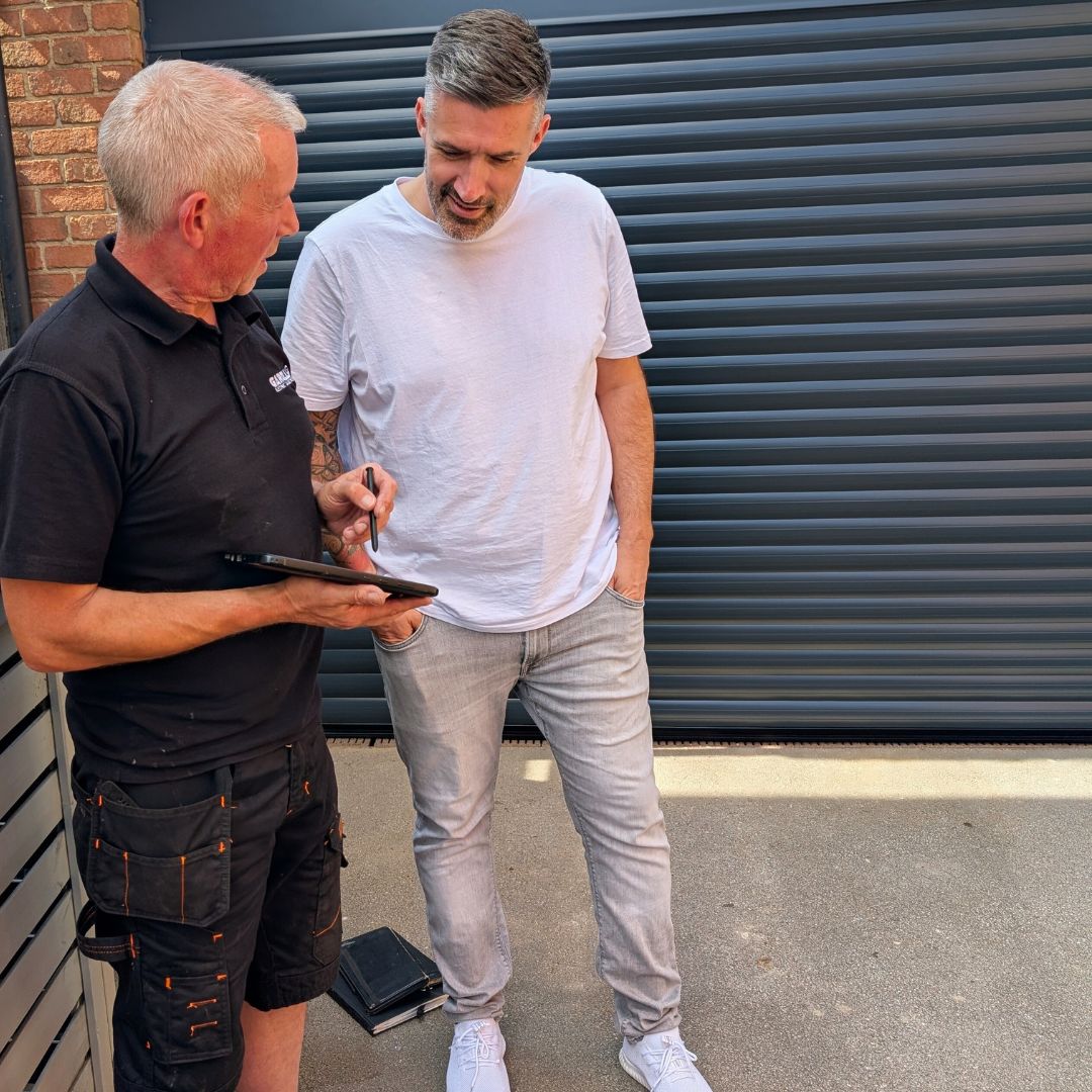 Garolla engineer and customer going over the final install checklist