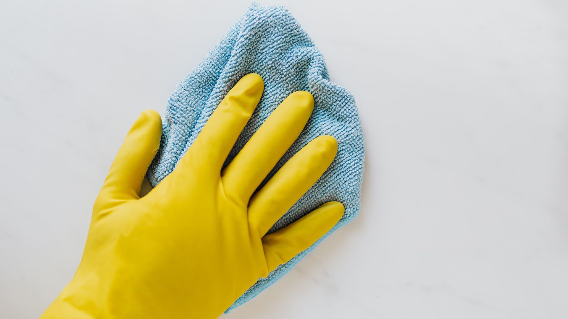 Cleaning garage door with a cloth