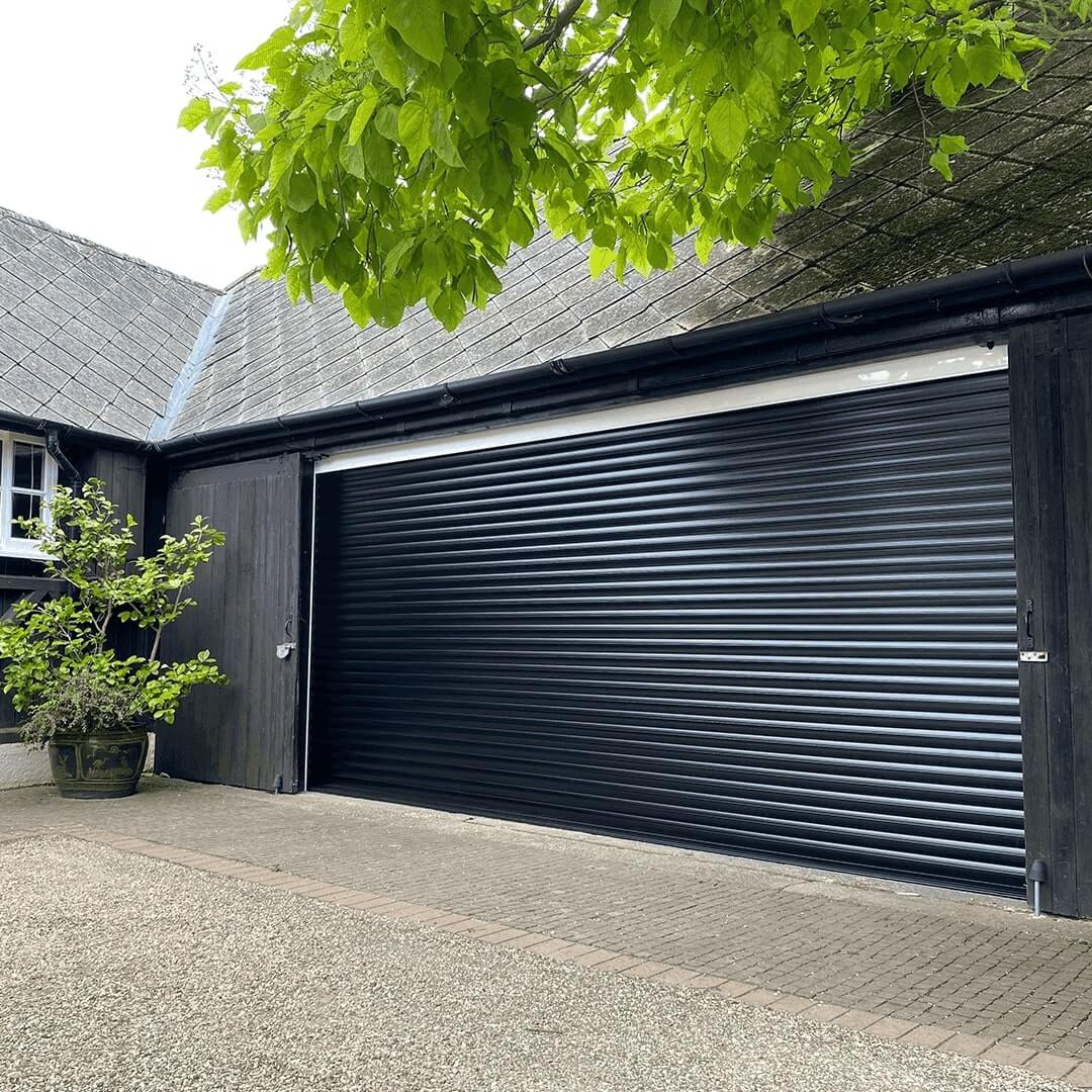 Large black Garolla Titan 77mm electric garage door