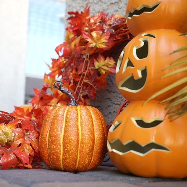 Halloween pumpkins outside a home